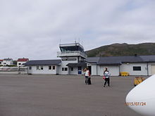 Passengers disembarking aircraft at Hasvik Airport